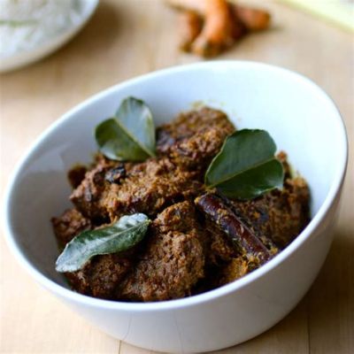  Rendang: Uma Sinfonia de Sabores Picantes e Cremosos que Te Transportará para as Profundezas da Cultura Indonésia!